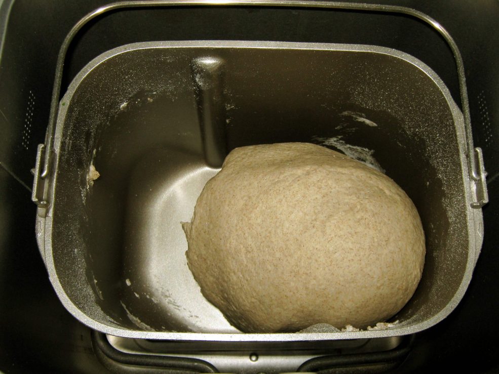 Dough in a bread maker pan.